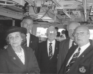 Shipmates Esme Ketteridge, Alan Driver, Ron Fitt, Alf Wiggins and John Pye on the bridge of HMS Norfolk